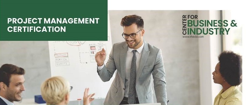 An instructor speaking to three adults taking a course. Project Management Certification course from the Daytona State College Center for Business & Industry. The link will open the DSC's Center for Business & Industry Project Management Certification webpage. An instructor speaking to three adults taking a course. Project Management Certification course from the Daytona State College Center for Business & Industry. The link will open the DSC's Center for Business & Industry Project Management Certification webpage.